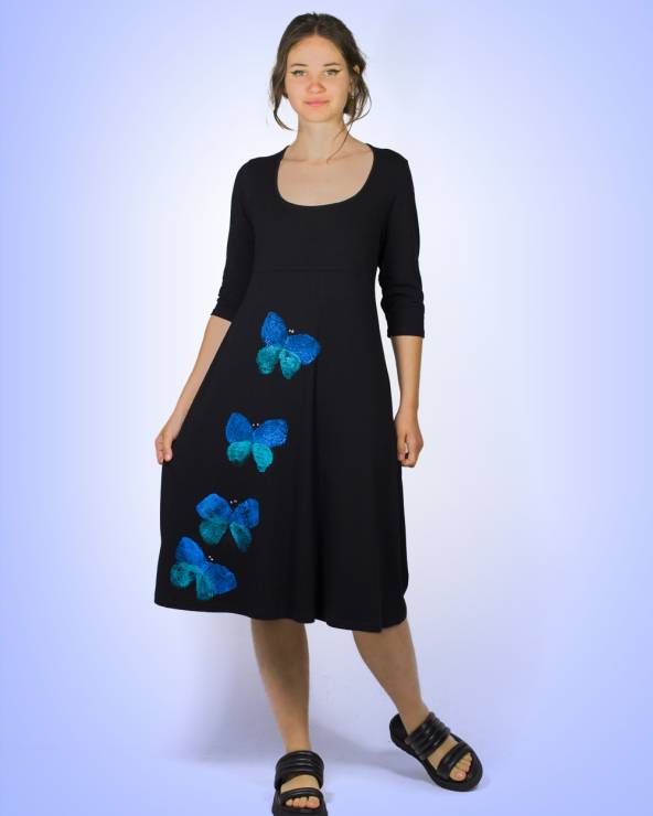 Vestit de punt amb mànigues i estampat.